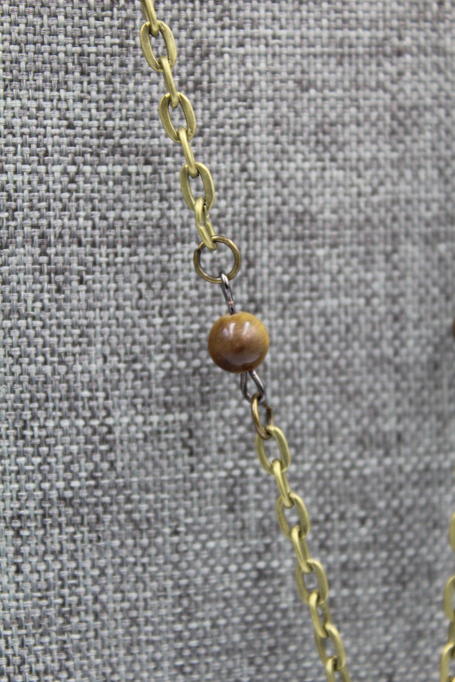 Hekas Creative: Tigers eye pendant with 6mm tigers eye beads and unbleached snake vertebrae