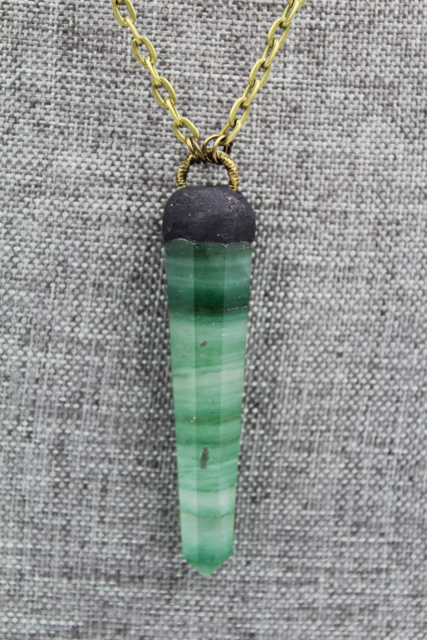 Hekas Creative: Green Fluorite point pendant with African turquoise 6mm beads and unbleached snake vertebrae