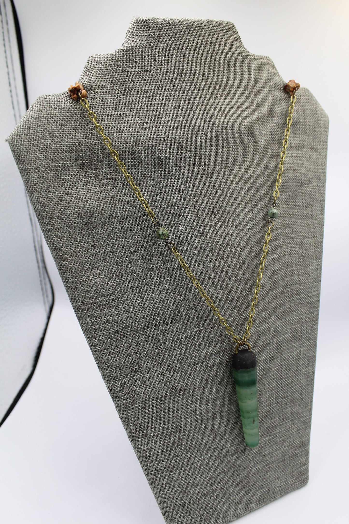Hekas Creative: Green Fluorite point pendant with African turquoise 6mm beads and unbleached snake vertebrae