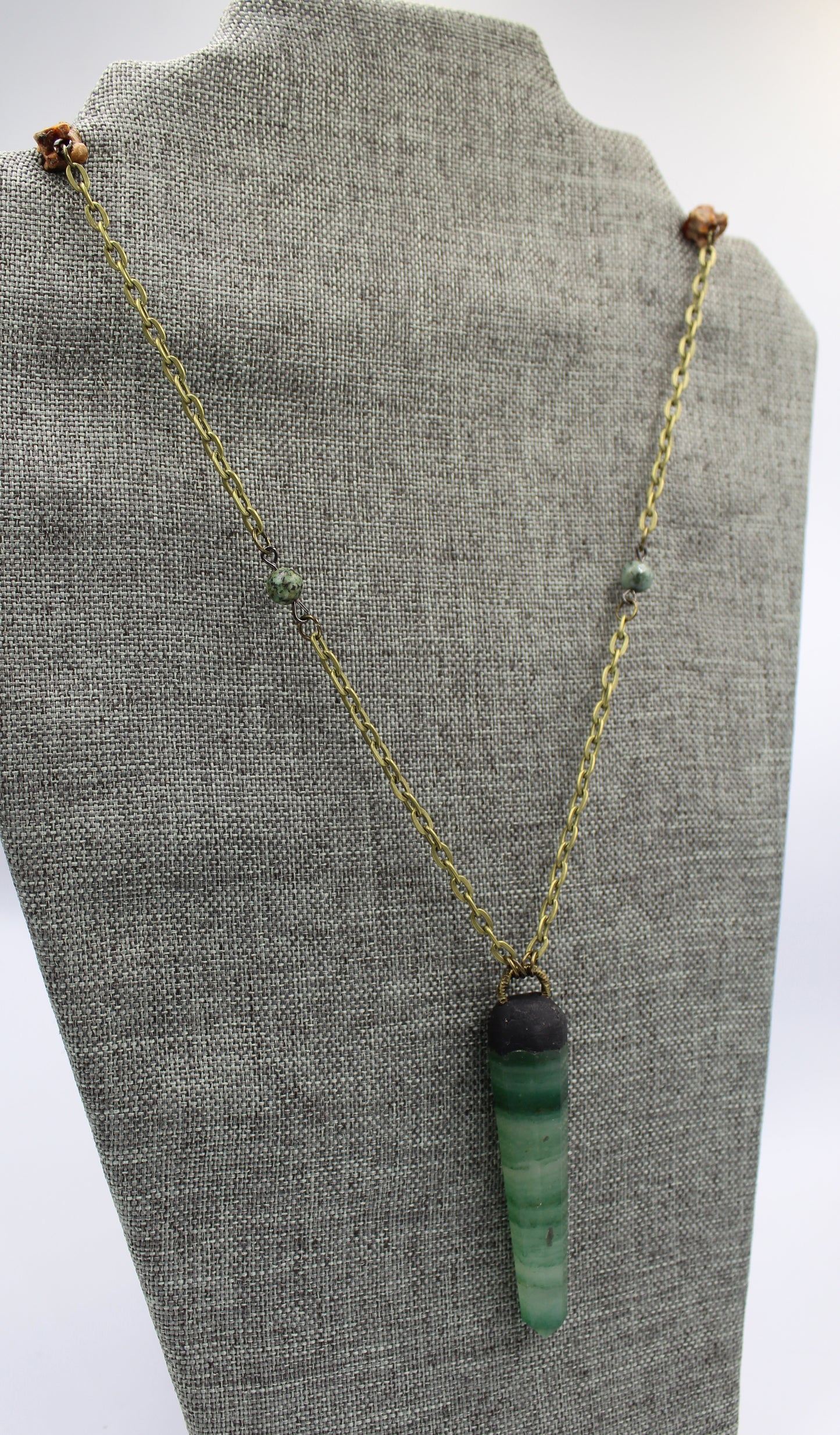 Hekas Creative: Green Fluorite point pendant with African turquoise 6mm beads and unbleached snake vertebrae