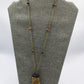 Hekas Creative: Tigers eye pendant with 6mm tigers eye beads and unbleached snake vertebrae