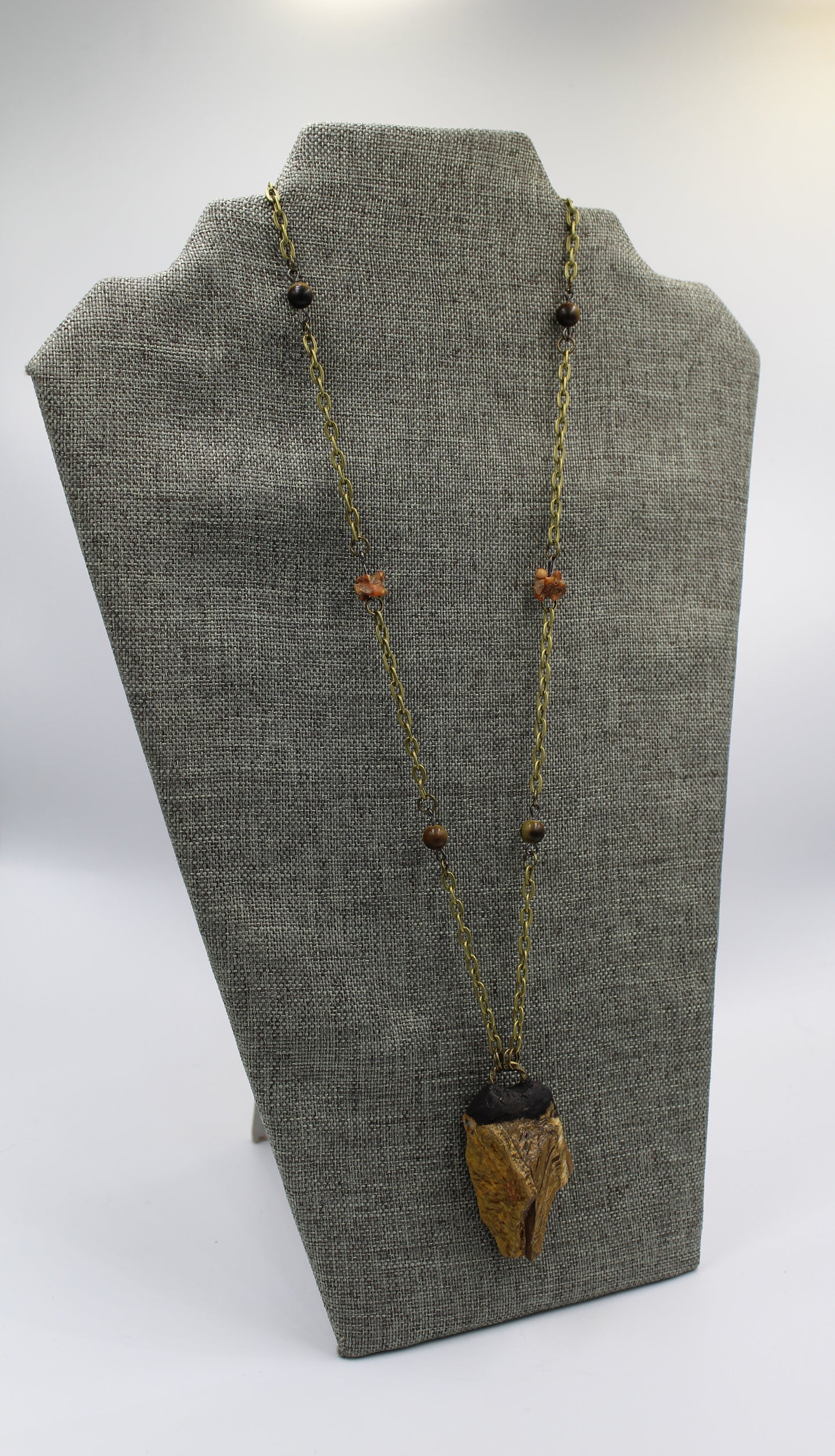 Hekas Creative: Tigers eye pendant with 6mm tigers eye beads and unbleached snake vertebrae
