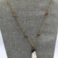 Hekas Creative: Citrine pendant, tigers eye 6mm beads, unbleached snake vertebrae