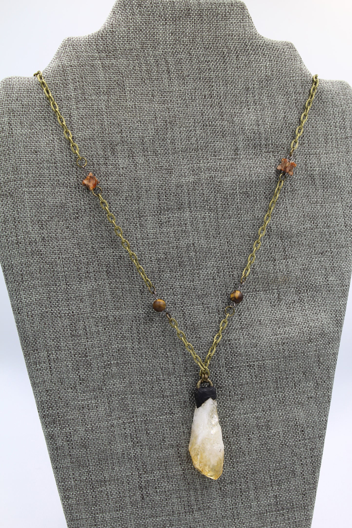 Hekas Creative: Citrine pendant, tigers eye 6mm beads, unbleached snake vertebrae