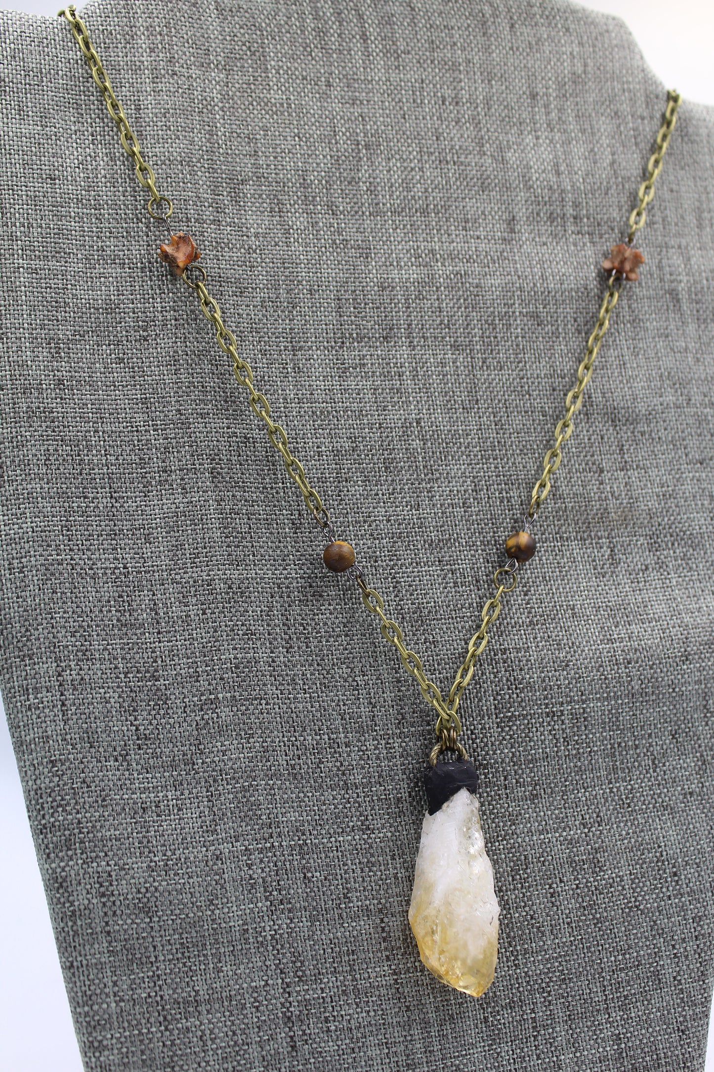 Hekas Creative: Citrine pendant, tigers eye 6mm beads, unbleached snake vertebrae