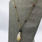 Hekas Creative: Citrine pendant, tigers eye 6mm beads, unbleached snake vertebrae