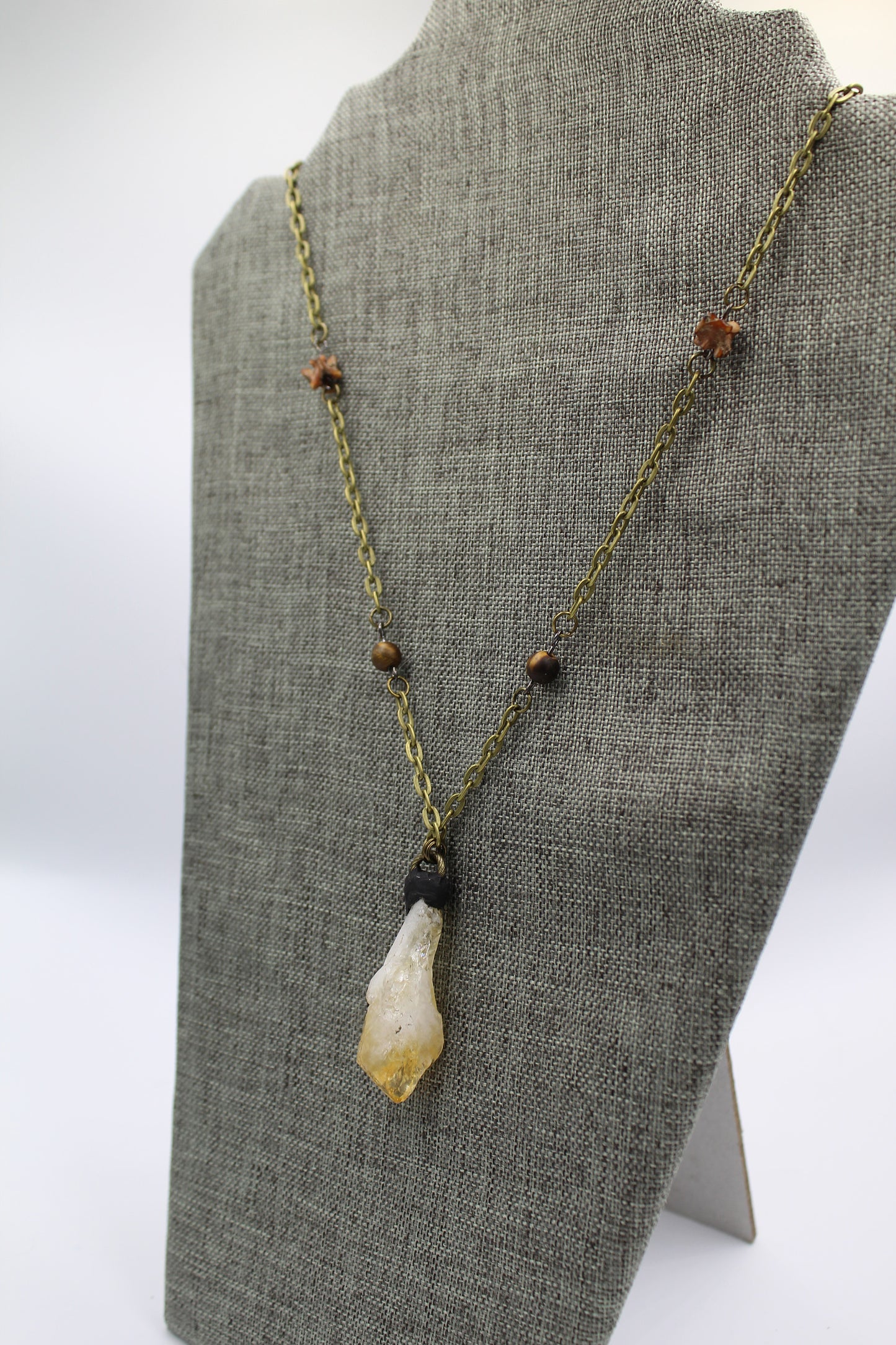 Hekas Creative: Citrine pendant, tigers eye 6mm beads, unbleached snake vertebrae