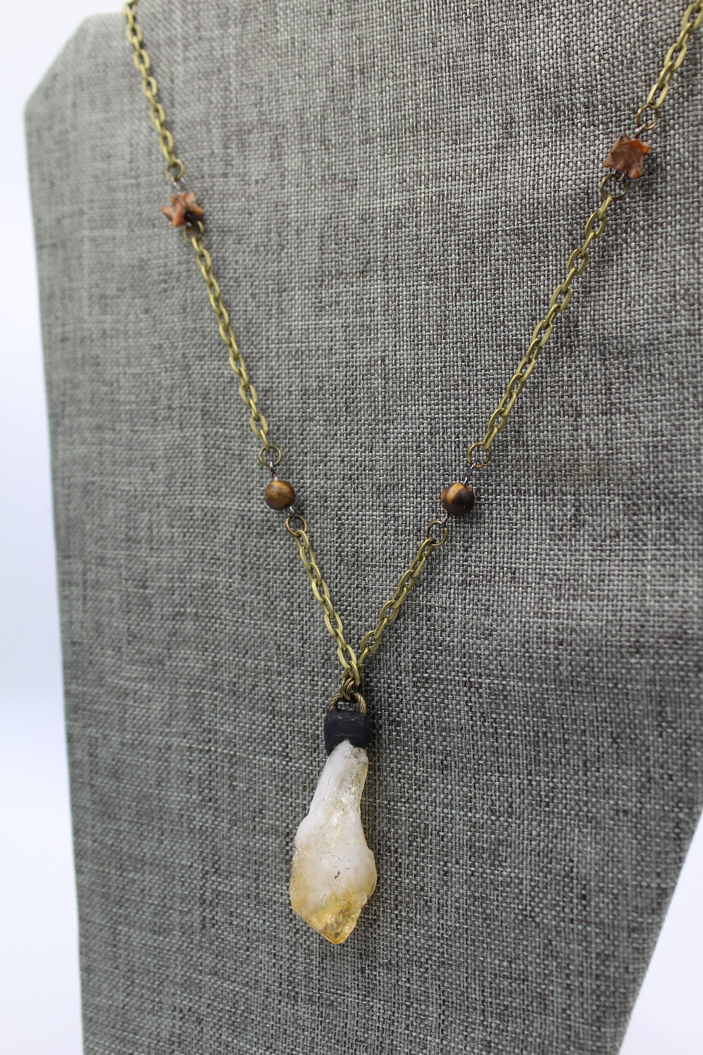 Hekas Creative: Citrine pendant, tigers eye 6mm beads, unbleached snake vertebrae