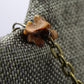 Hekas Creative: Citrine pendant, tigers eye 6mm beads, unbleached snake vertebrae