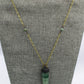 Hekas Creative: Green Fluorite point pendant with African turquoise 6mm beads and unbleached snake vertebrae